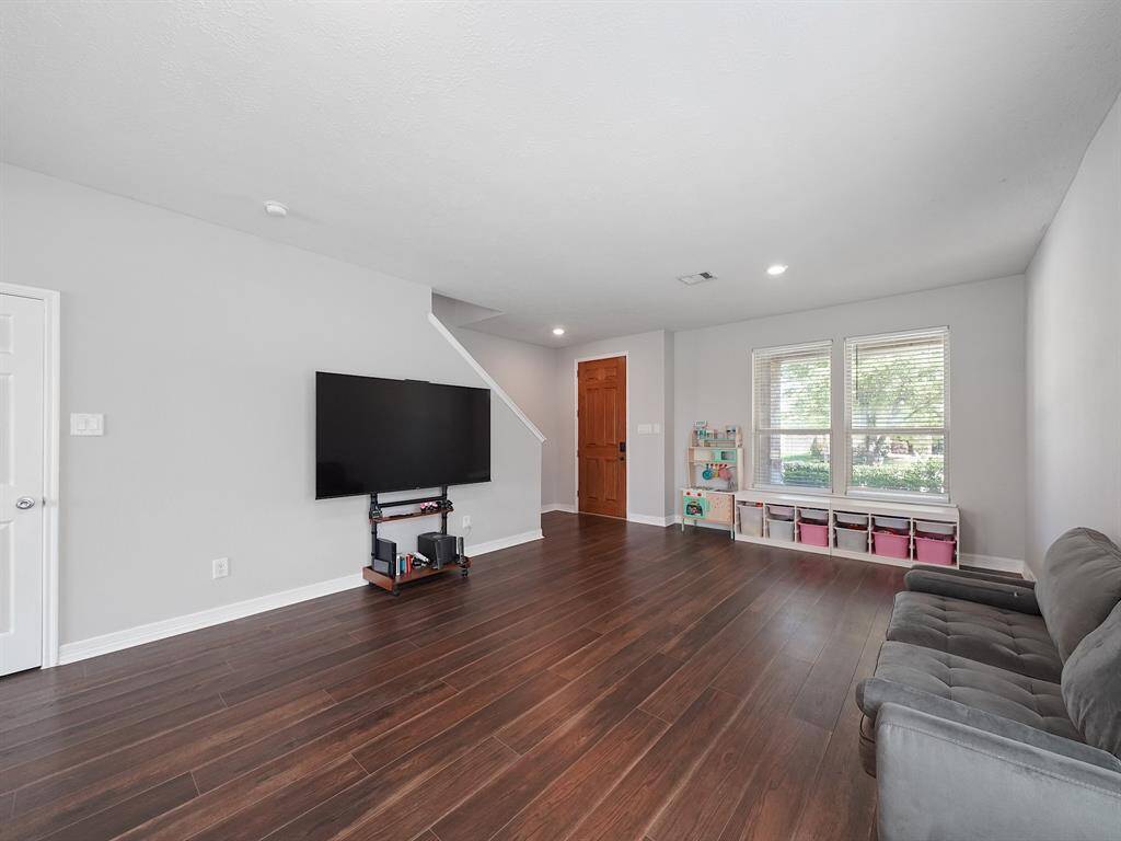 Different angle of living room. Showcasing the NEW Vinyl floors!