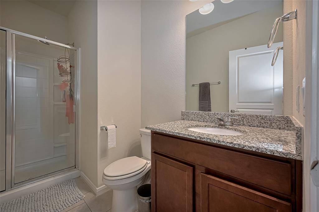 one of 2 additional full bathrooms upstairs. This one has a stand up shower.