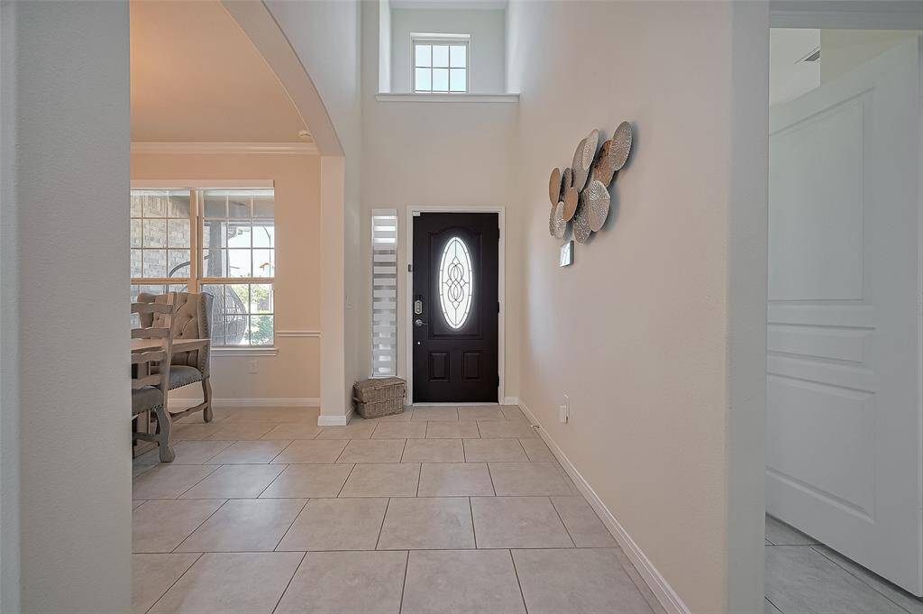 Step into comfort with a welcoming front porch add a bench or chairs—perfect for sipping morning coffee or enjoying evening breezes in style.