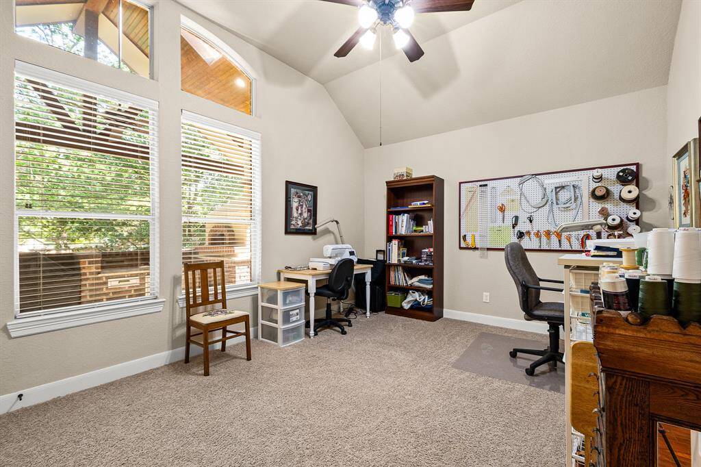 Enjoy this Bedroom #2 that has a large walk in closet and the room is currently used as a sewing room. Imagine creating something beautiful while watching the cook! It has access to the Hollywood Bath.