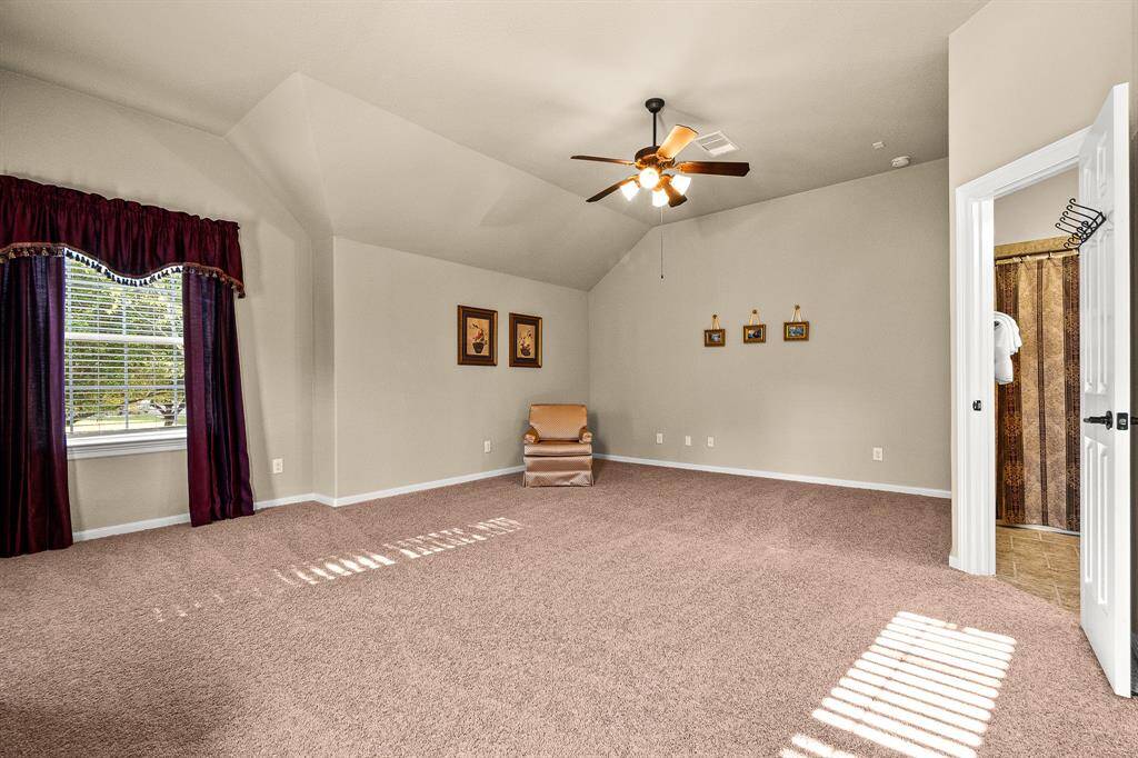 Head upstairs to the 2nd Primary Suite!  You could use it as a Gameroom or a 2nd Primary Suite.  It's so spacious!