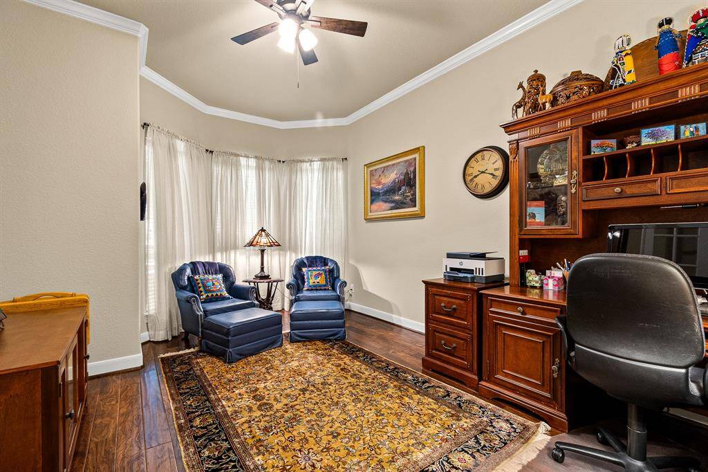 Inviting Study/Office features Bay windows and double glass doors. It gives a great space for seating or tables.