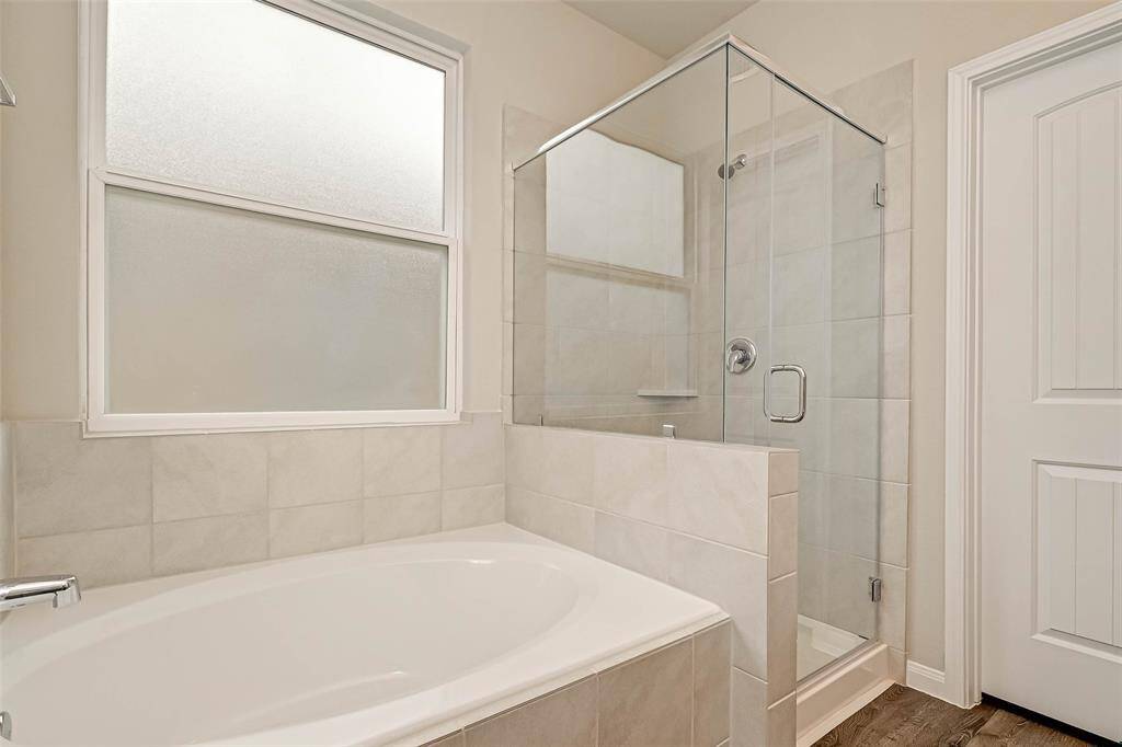 Primary bath with tub and shower
