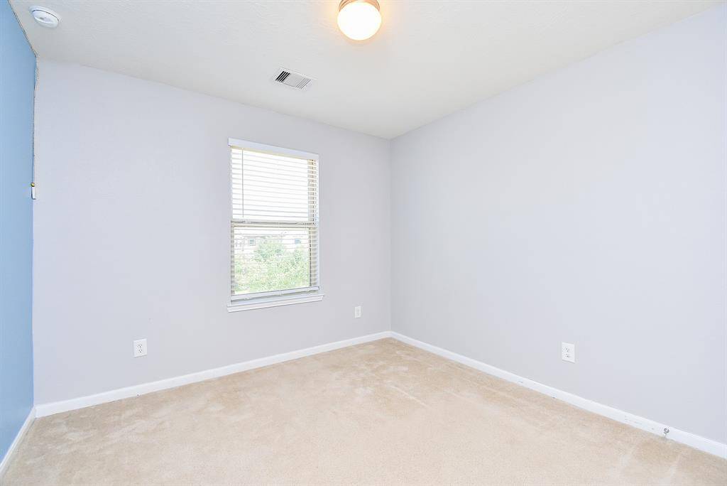 This third room is a peaceful retreat tucked upstairs with a relaxing feel and clean finishes. Ideal for siblings, guests, or a creative space like a craft or study room.