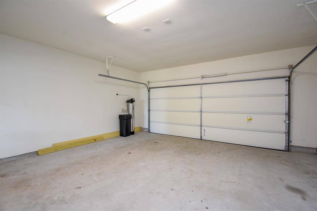 The attached garage provides secure and convenient parking with direct access to the home.