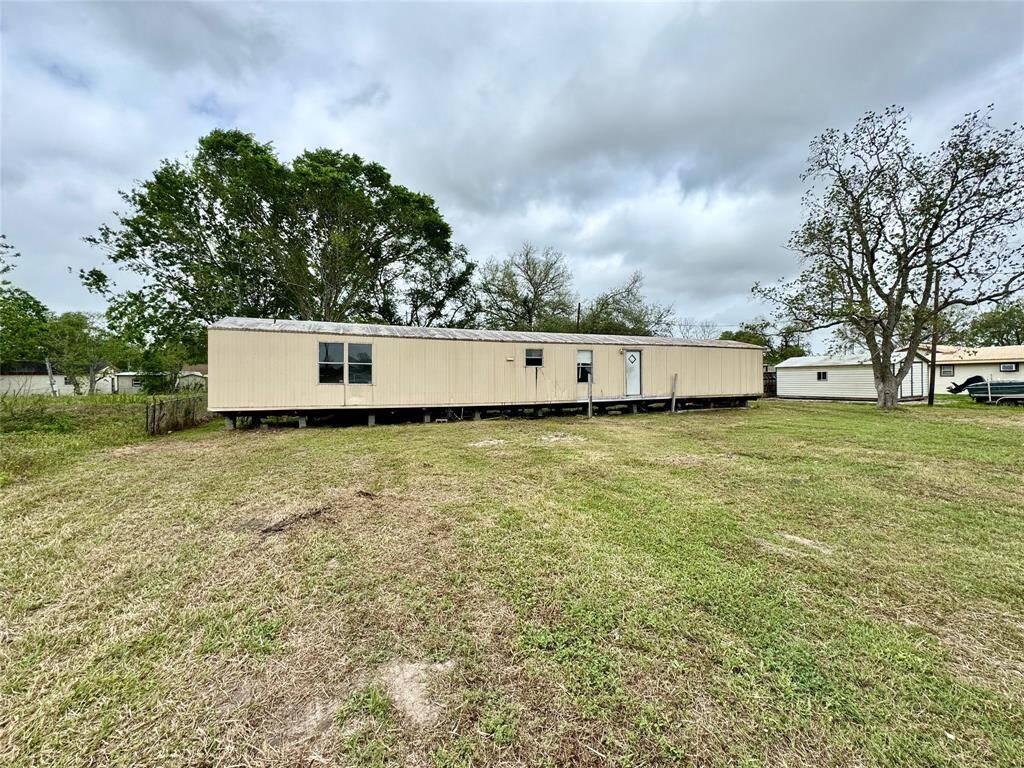 Over 1/2 an acres of land, all yours, trailer can stay too