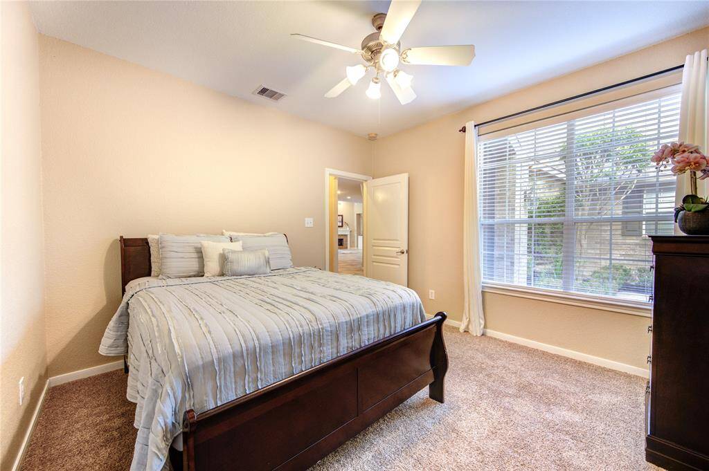 A rare find—this first-floor secondary bedroom is located near a full bathroom, making it perfect for guests, in-laws, or multi-generational living.