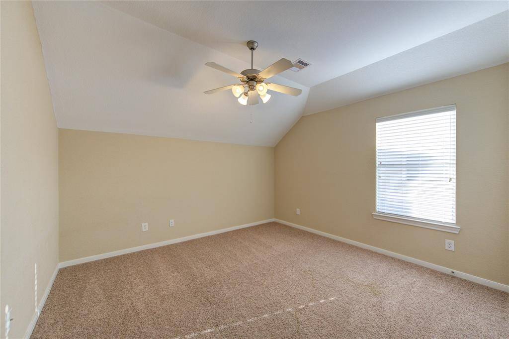 This home features two spacious secondary primary bedrooms on the second floor, each offering plush carpeting and ample closet space.