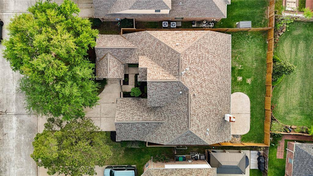 The stunning aerial view of the property showcases the spacious layout of the home, emphasizing its prime location within the neighborhood.