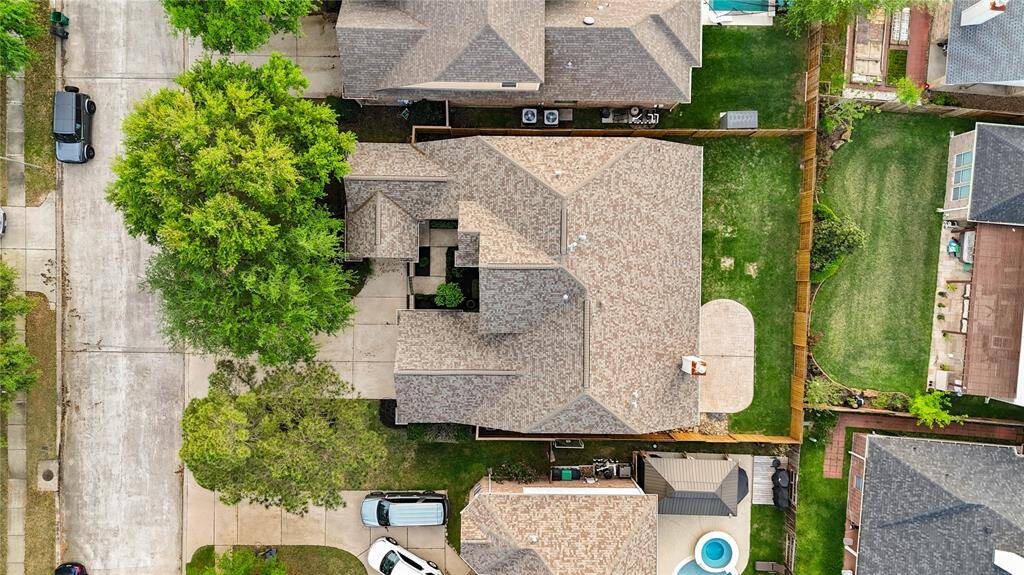 You’ll appreciate the expansive backyard, perfect for outdoor activities or future additions, as well as the well-maintained landscaping and mature trees that provide both beauty and privacy.