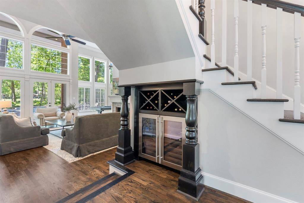 Stylish wine fridge and custom storage area—perfect for entertaining or showcasing your collection in style.