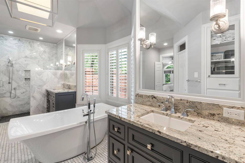Experience convenience and luxury with double sinks, an oversized shower, and two spacious primary closets.