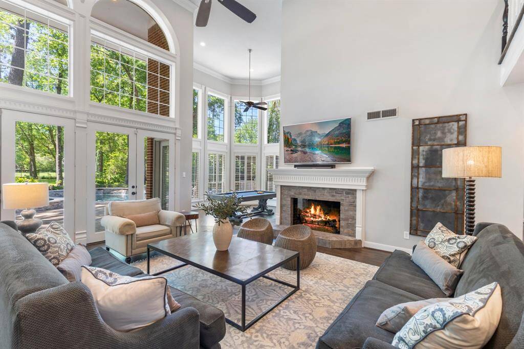 Step into the formal living space, where high ceilings create an atmosphere of elegance and openness.