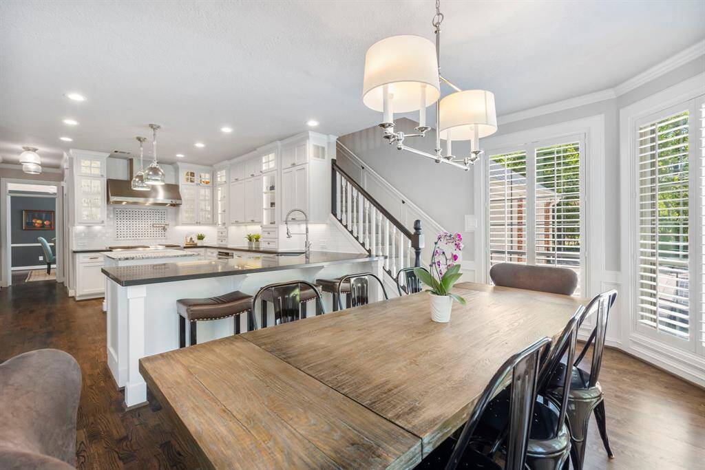 Beautifully updated fixtures throughout enhance the charm of this spacious home.