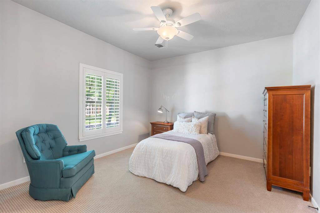 Freshly painted spacious secondary bedroom, offering a bright and inviting space