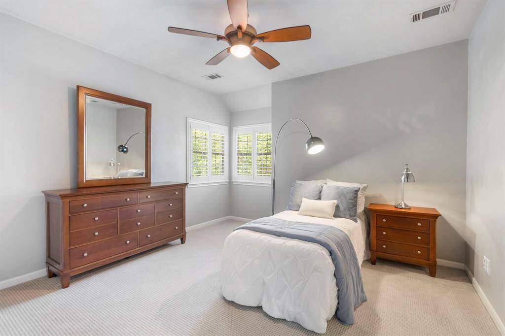 Large secondary bedrooms offer ample space for comfort and versatility,