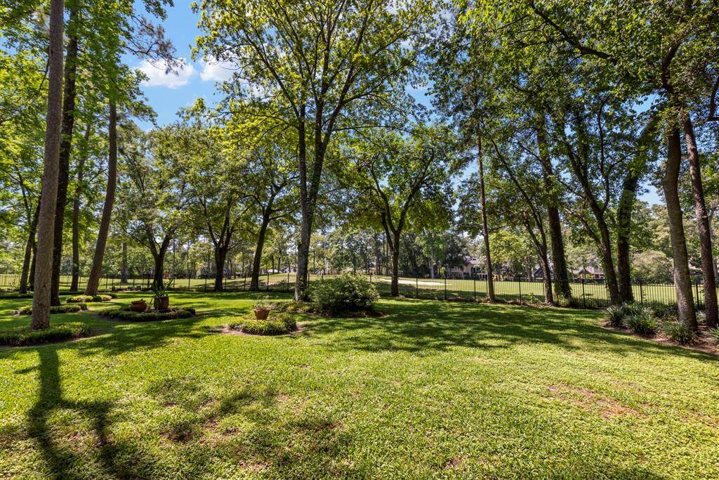 Nestled on an expansive .8-acre lot
