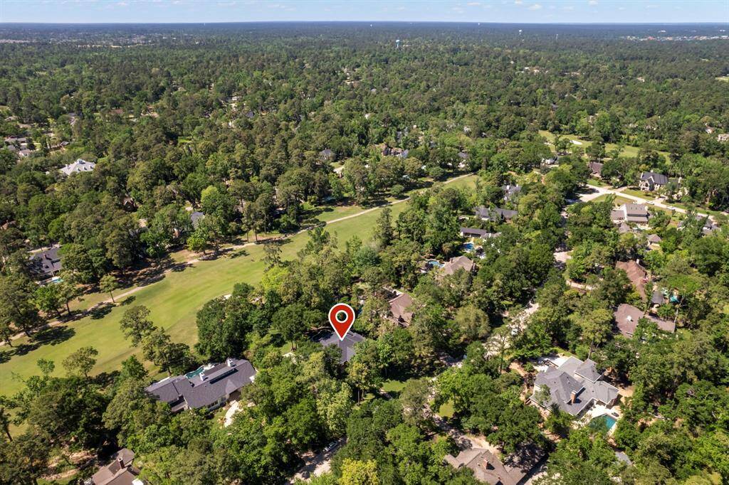 Golf course living at its finest, located on The Woodlands par 72 West Course.