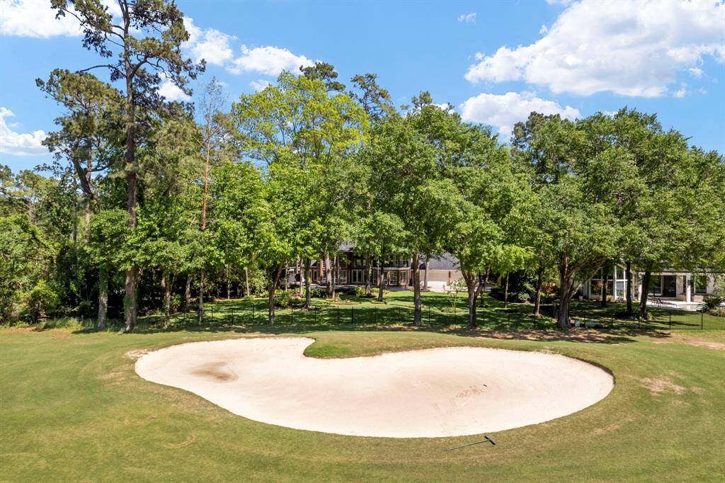 View from the golf course to the backyard.