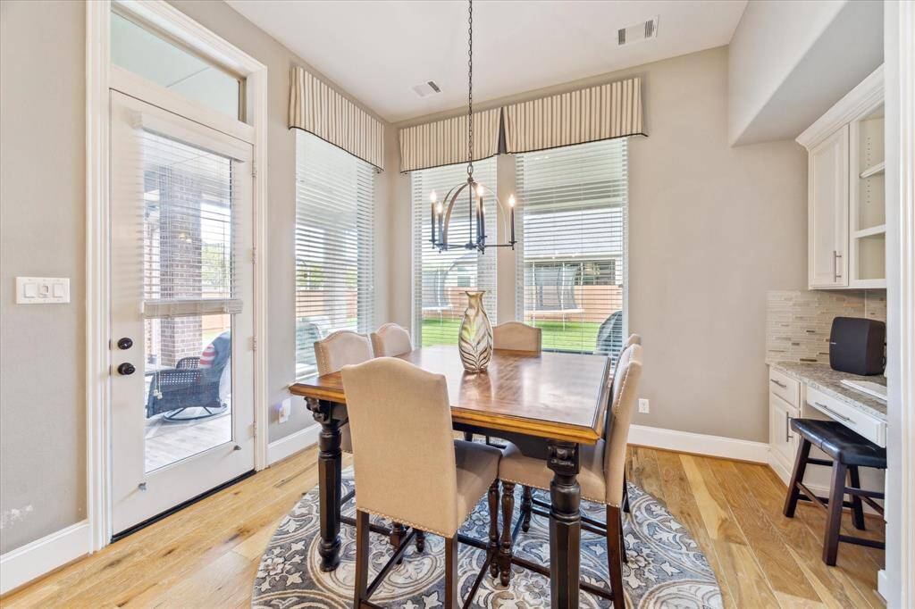 Large Breakfast nook with bill pay desk right off the Kitchen!