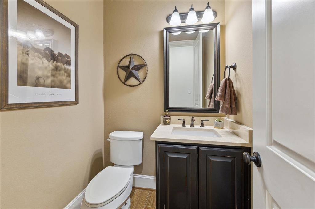 Half bath located right off living room and kitchen!