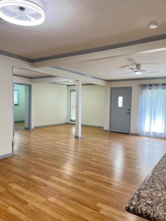 Living room, looking towards the front door