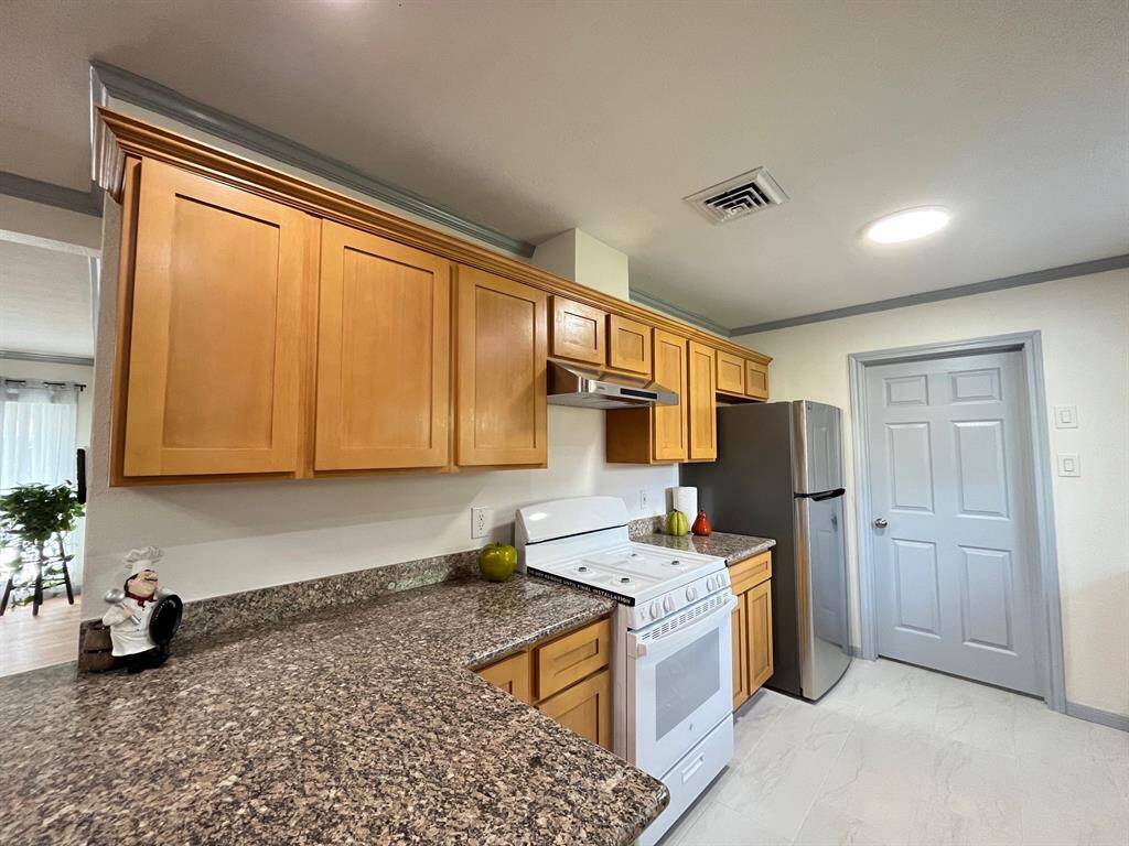 Tons of storage in the cabinets of the kitchen