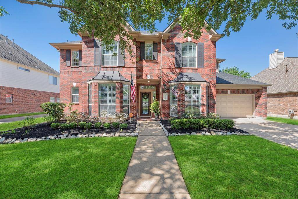 Welcome home to 26227 Longmont Park, nestled in the prestigious Cinco Ranch - Highland Park community!