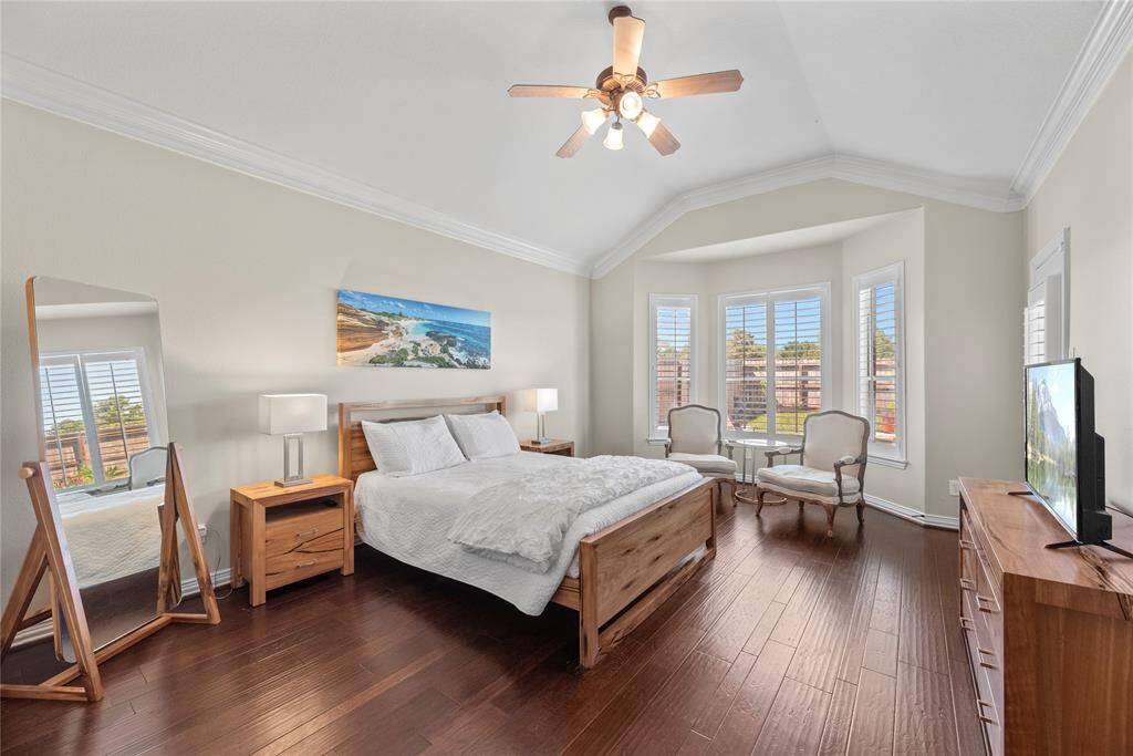 How perfect is this primary suite? Spacious and filled with natural light, this serene retreat offers the ultimate escape, promising comfort, tranquility, and pure relaxation.