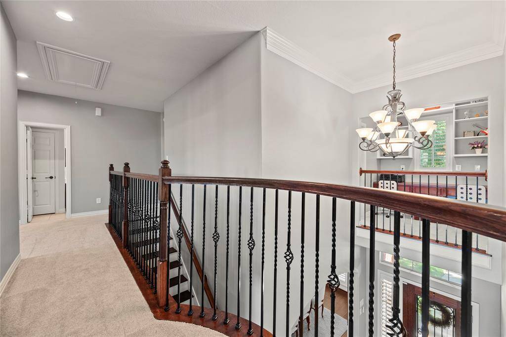 Now let’s take a look at the upstairs. Even the staircase exudes elegance, featuring a harmonious blend of neutral hues and exquisitely crafted designer iron spindles.