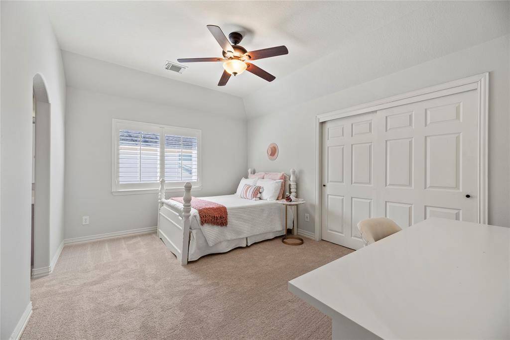 With ample room to accommodate various arrangements, the fourth bedroom serves as a perfect retreat for family or guests.