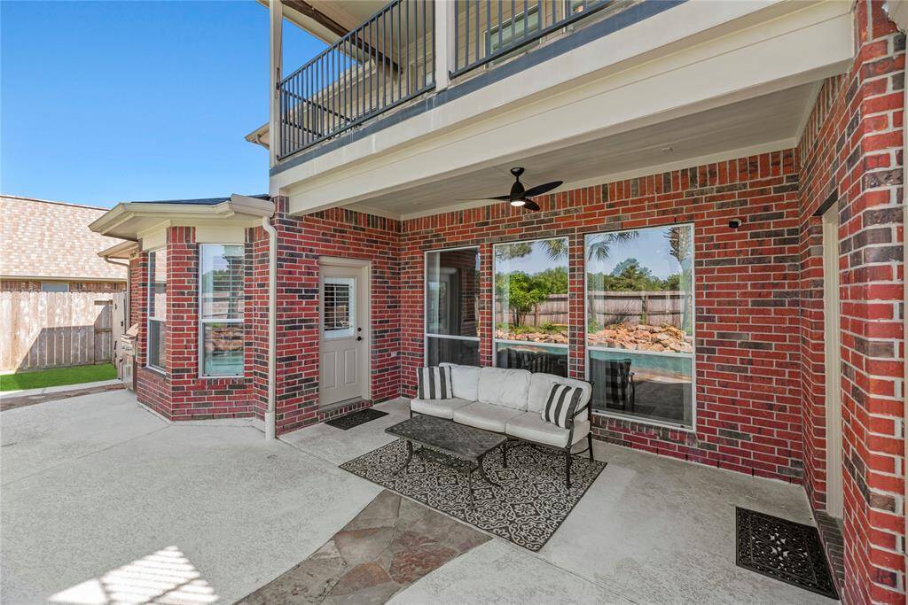 The covered patio is an easy place to sit back and watch the sunset or just get some “you time” in the fresh air.