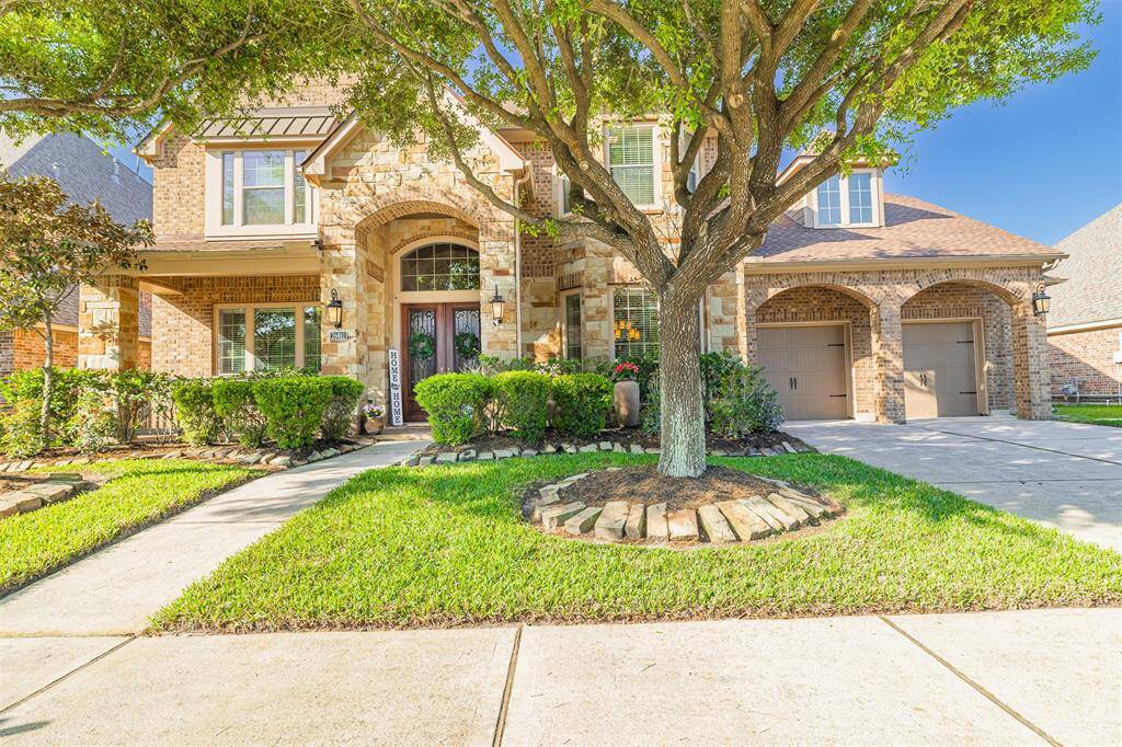 Stunning 5-bedroom, 4.5-bath home on a cul-de-sac with no back neighbors and gorgeous lake views.