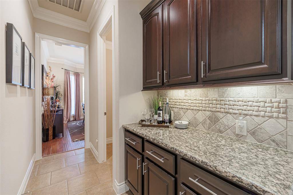 Butler's pantry connects the kitchen and formal dining room.