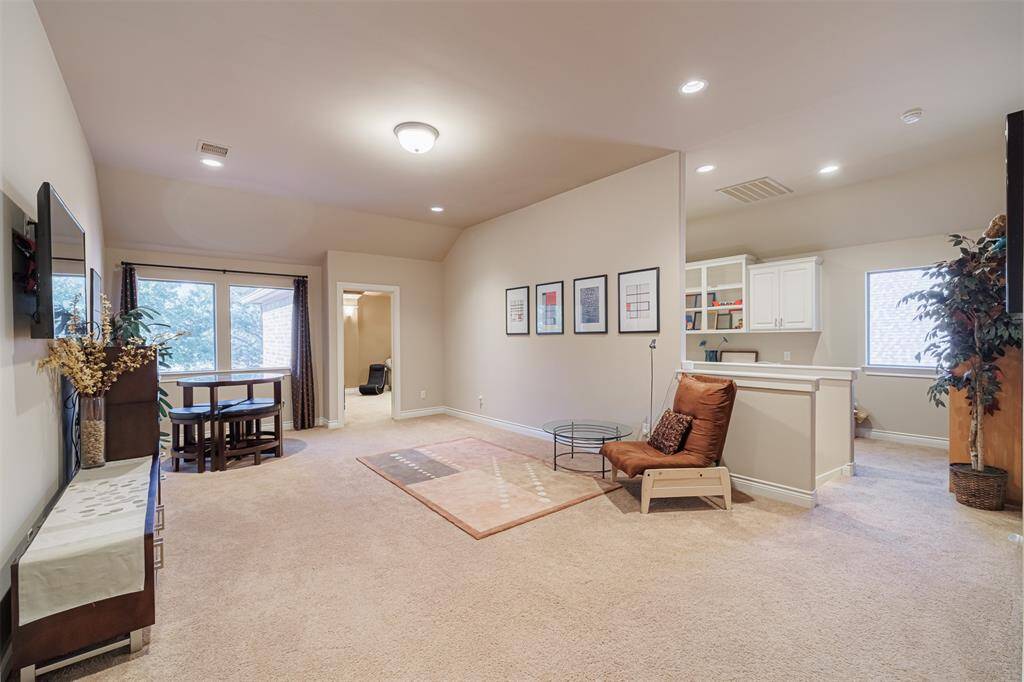 Large game room located upstairs.