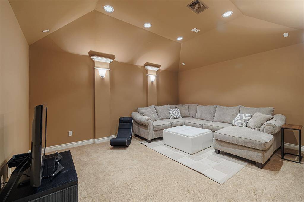 Media room located upstairs is wired for surround sound and is sound proofed.