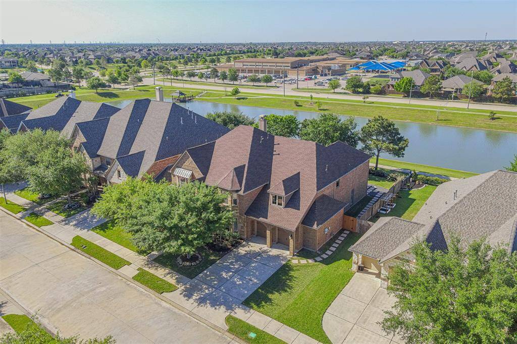 Aerial view of the home and lake.