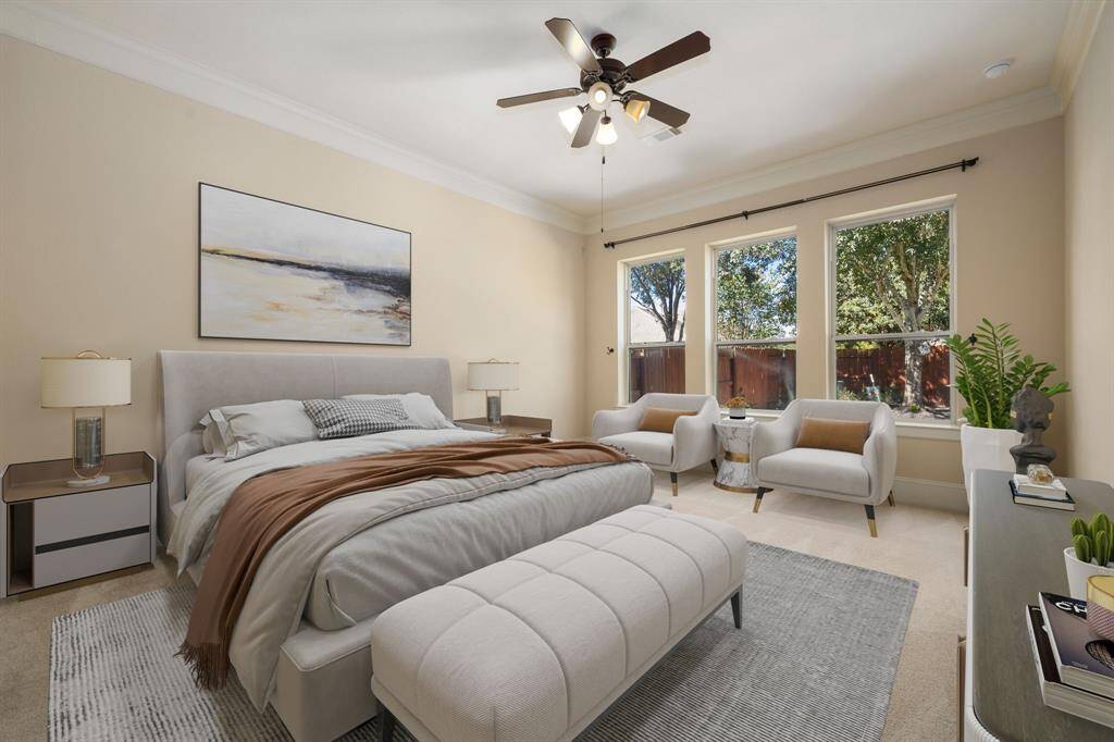 What a wonderful place to come home to, this stunning primary suite greets you with plush carpet floors, a warm neutral paint, high ceilings, crown molding, ceiling fan with lighting, lovely windows allowing in natural light brightening up this spacious primary bedroom, with extra space for a seating area.