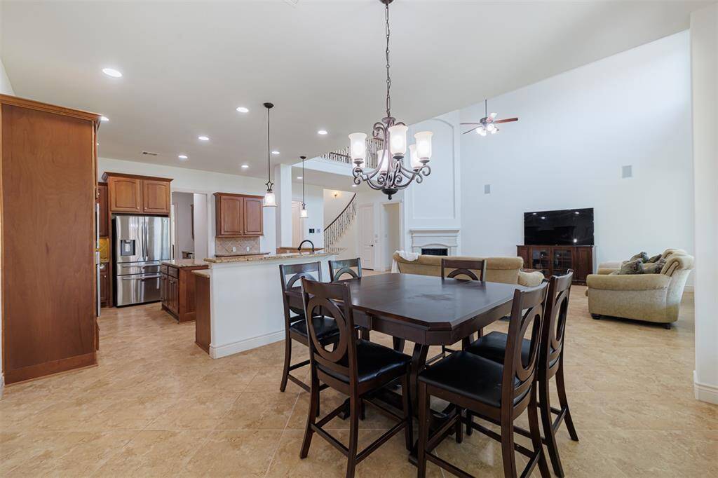 View of the kitchen and family room from the breakfast area.