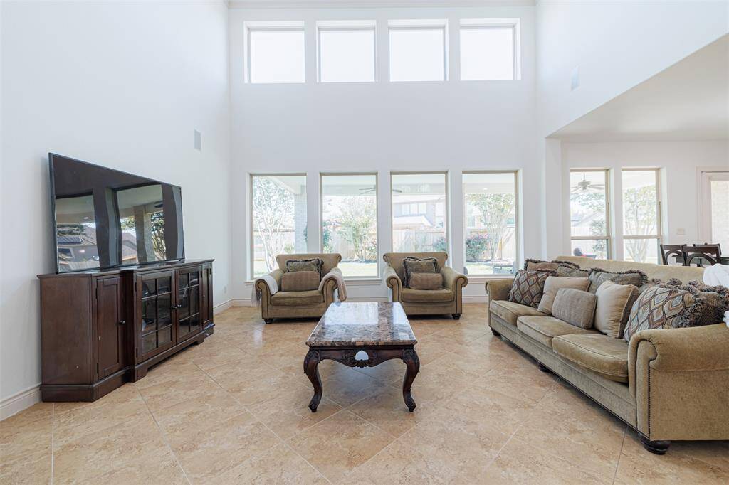 The wall of windows in the family room gives this space lots of natural lighting.
