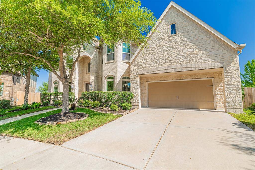 This home also features a 3-car attached tandem garage.