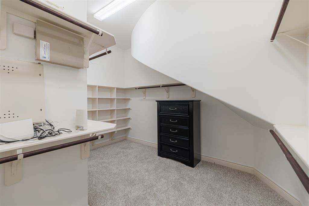 Large walk-in closet in the primary suite.