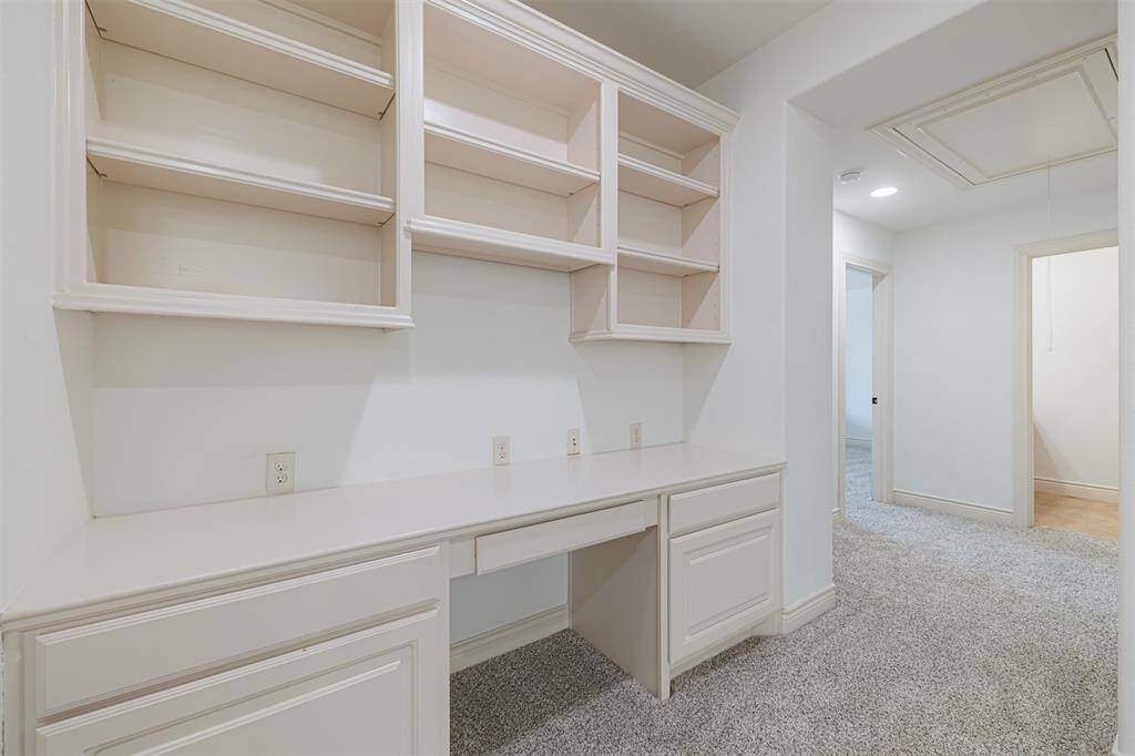 Built-in desk located off the game room.