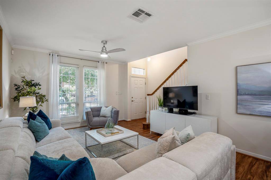 Spacious living room perfect for comfortable seating and entertaining.