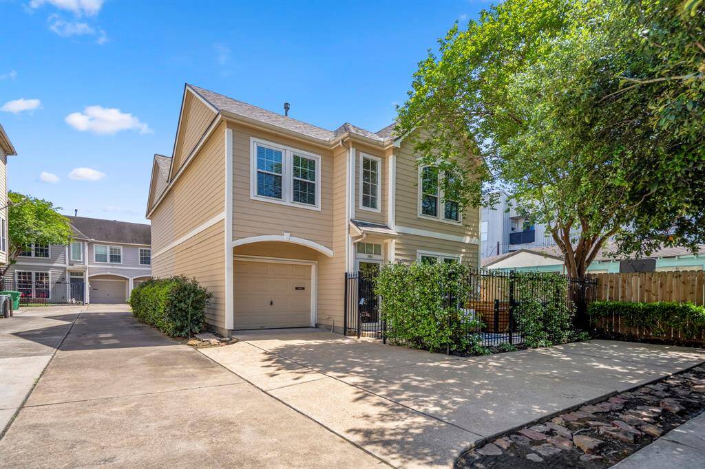 Convenient attached garage for secure parking and extra storage.
