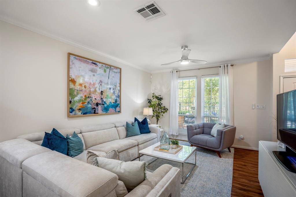 Flooded with natural light from expansive windows.