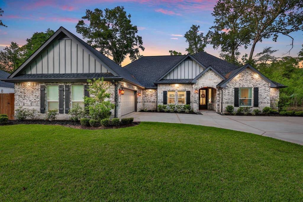 This view draws attention to the impressive oversized island, seamlessly blending style and functionality.