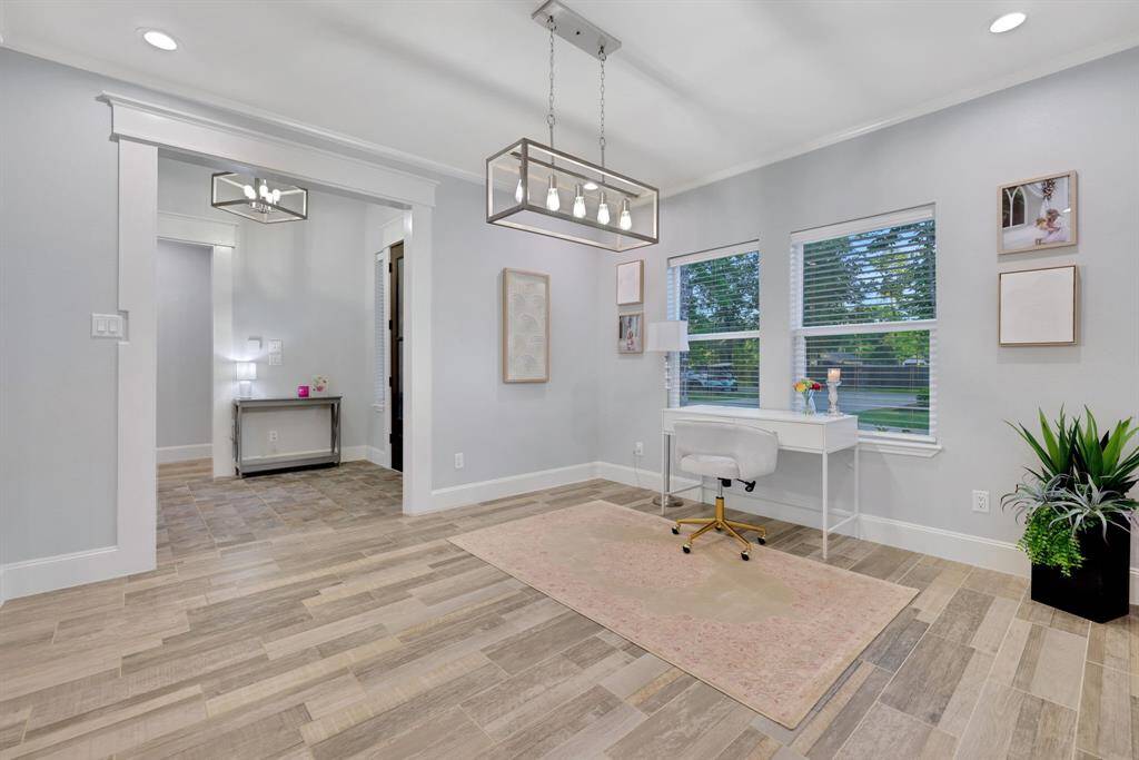 This versatile space offers endless possibilities—perfect for a dining room, office, or flex area to suit your needs