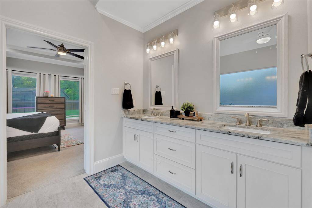 Thoughtfully designed with dual sinks, the primary bath ensures comfort and ease for shared living.