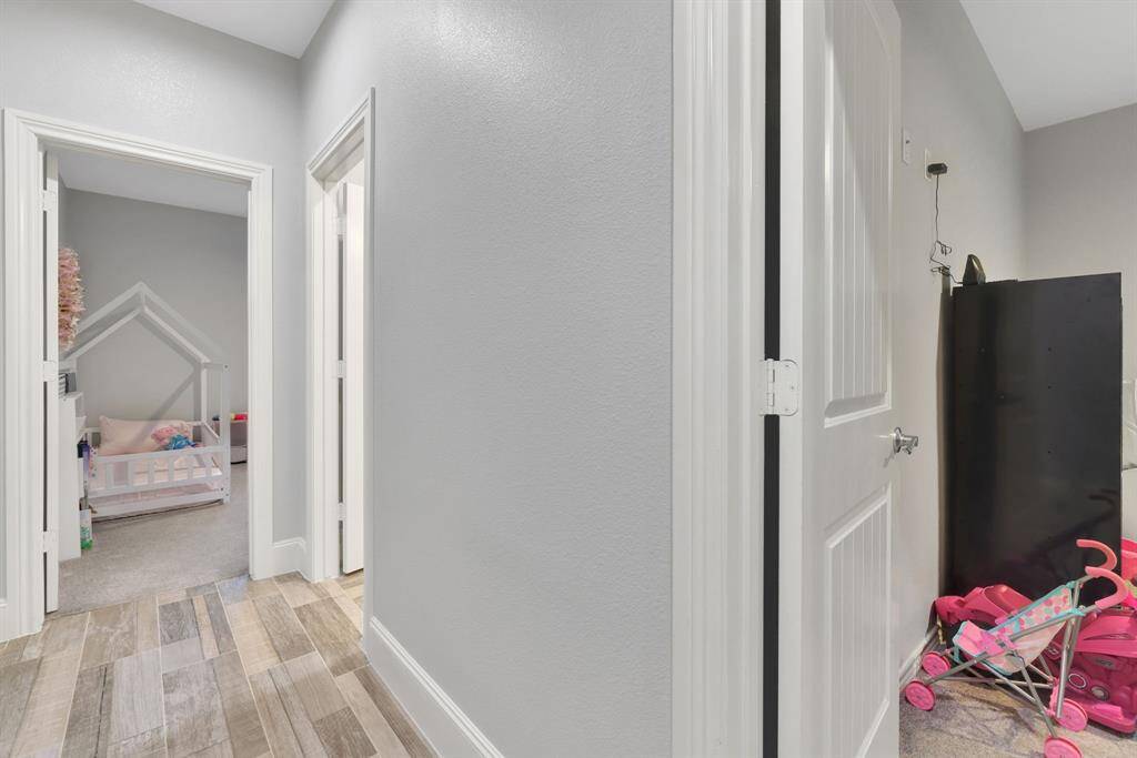 A thoughtfully designed hallway leads to three Bedrooms.
